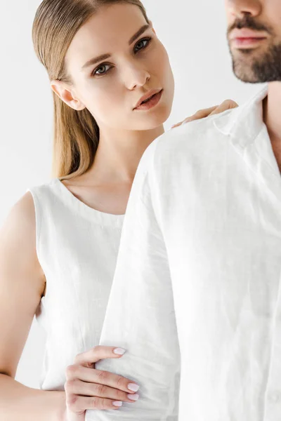 Cropped image of man and his girlfriend in linen clothes isolated on grey background — Stock Photo