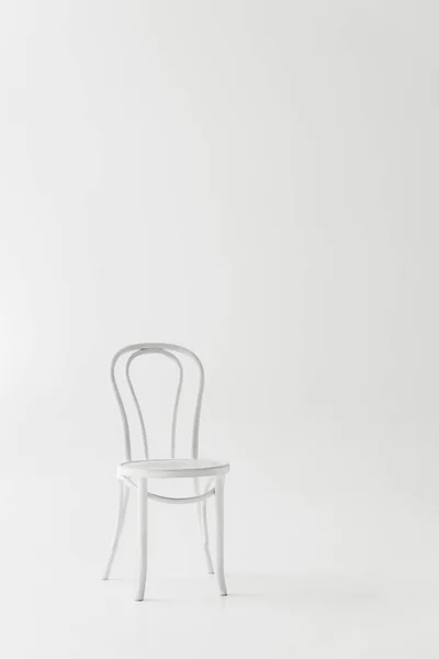 Front view of white chair isolated on grey background — Stock Photo