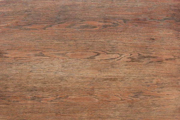 Full frame image of empty brown wooden table — Stock Photo