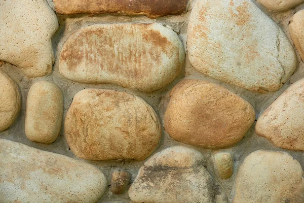 Vue rapprochée de la texture des murs en pierre altérée, fond plein cadre — Photo de stock