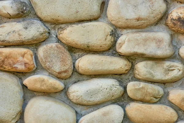 Vista de cerca de fondo texturizado pared de piedra gris - foto de stock