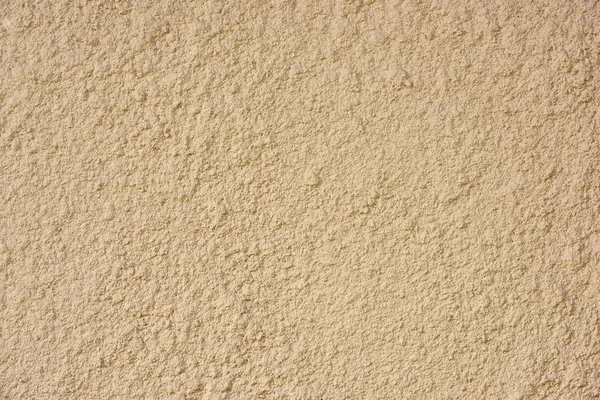 Close-up view of light brown concrete wall texture — Stock Photo