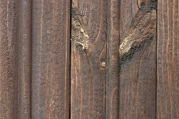 Vue rapprochée des planches de bois brun foncé, fond plein — Photo de stock