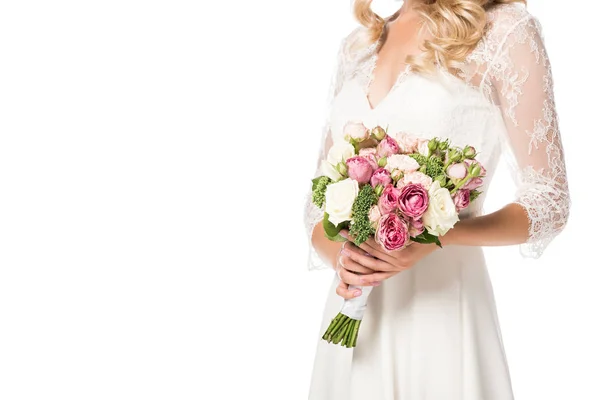 Cropped shot of bride holding beautiful bouquet isolated on white — Stock Photo