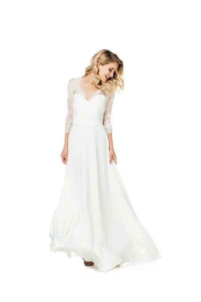 Красива молода наречена в стильній весільній сукні ізольована на білому — стокове фото