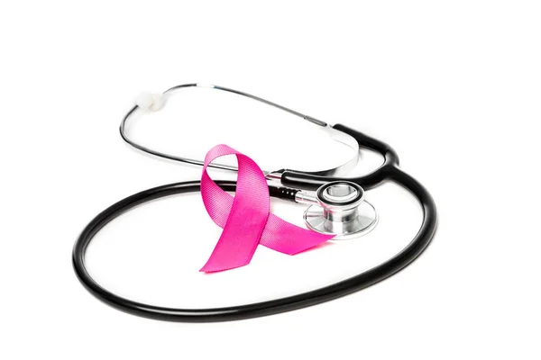 Pink breast cancer awareness ribbon and stethoscope isolated on white — Stock Photo