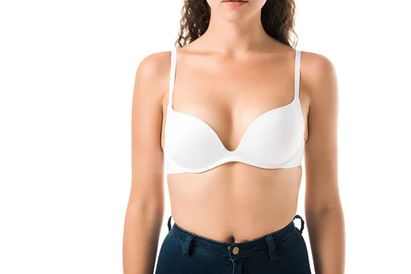 Cropped shot of young woman in bra isolated on white — Stock Photo
