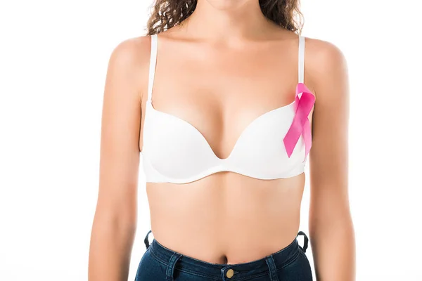 Cropped shot of young woman in bra with pink ribbon, breast cancer awareness concept — Stock Photo