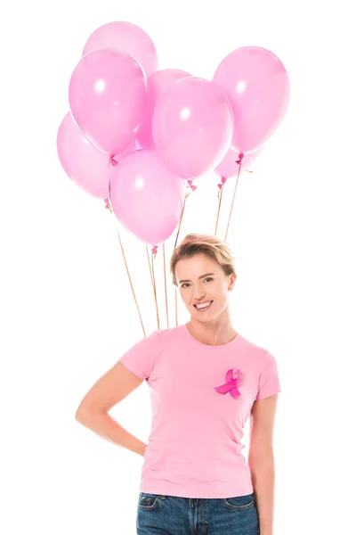 Mulher de meia-idade segurando balões rosa e sorrindo para a câmera isolada em branco, conceito de câncer de mama — Fotografia de Stock