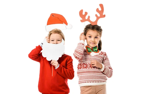 Adorable little kids with christmas masks isolated on white — Stock Photo