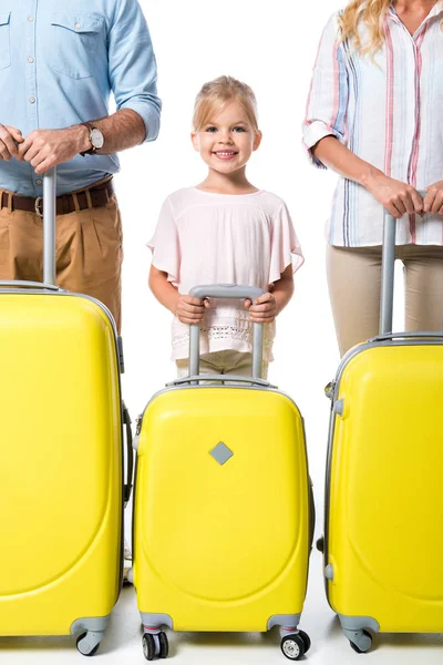Família feliz com bagagem isolada no branco — Fotografia de Stock
