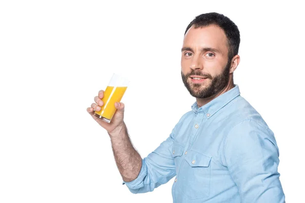 Bearded man drinking orange juice isolated on white — Stock Photo