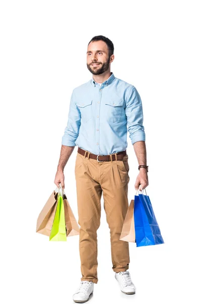 Uomo barbuto con borse della spesa isolato su bianco — Foto stock