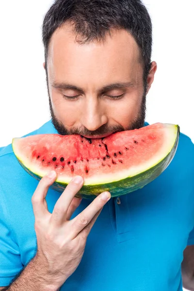 Man biting watermelon isolated on white — Stock Photo