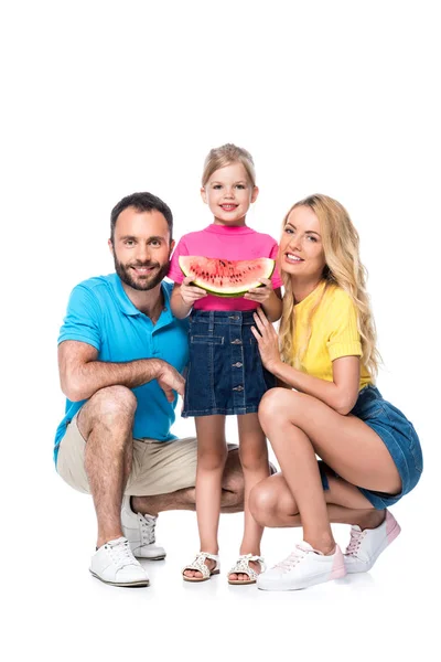 Щаслива сім'я з кавуном ізольована на білому — стокове фото