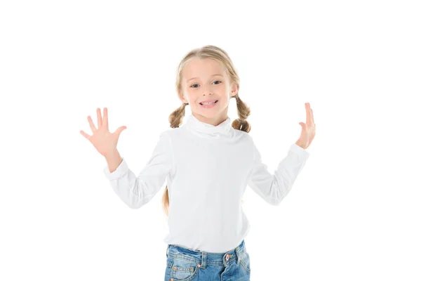 Criança sorridente com tranças gesticulando e posando isolada no branco — Fotografia de Stock