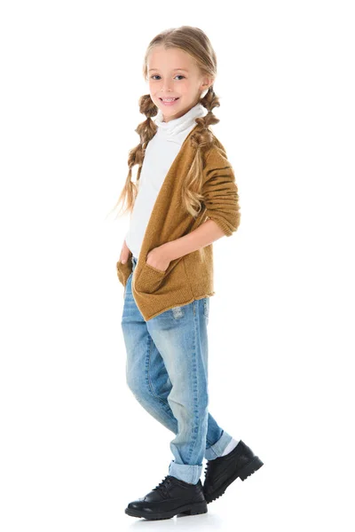 Adorable smiling kid posing in autumn outfit, isolated on white — Stock Photo