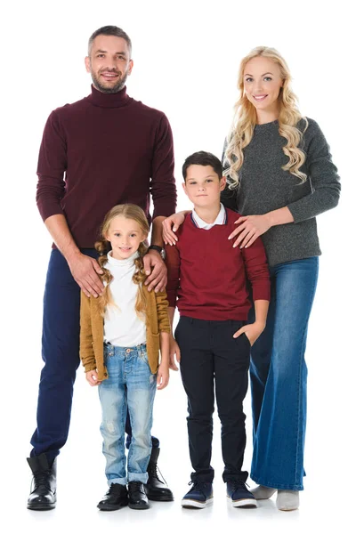 Parents avec adorables enfants posant isolés sur blanc — Photo de stock