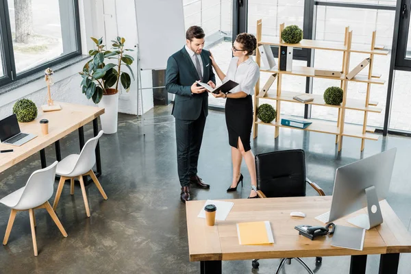 High angle view of young business colleagues in office — Stock Photo