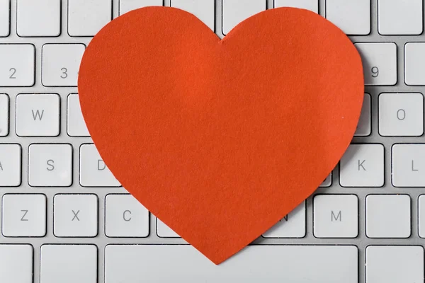 Top view of blank orange computer mouse mat on keyboard — Stock Photo