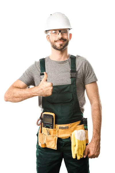 Smiling handsome electrician showing thumb up isolated on white — Stock Photo