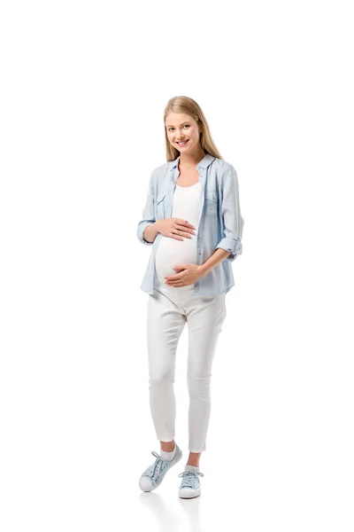 Attractive pregnant woman in casual clothes looking at camera isolated on white — Stock Photo