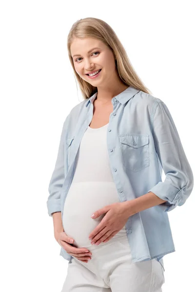 Attraktive glückliche schwangere Frau in lässiger Kleidung, die in die Kamera schaut, isoliert auf Weiß — Stockfoto