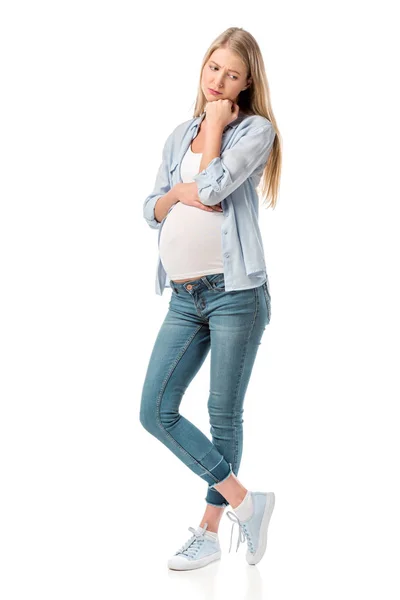 Thoughtful depressed pregnant woman in casual clothes isolated on white — Stock Photo