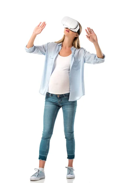Pregnant woman in vr headset looking up isolated on white — Stock Photo