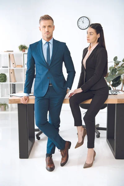 Businesspeople at workplace in office — Stock Photo