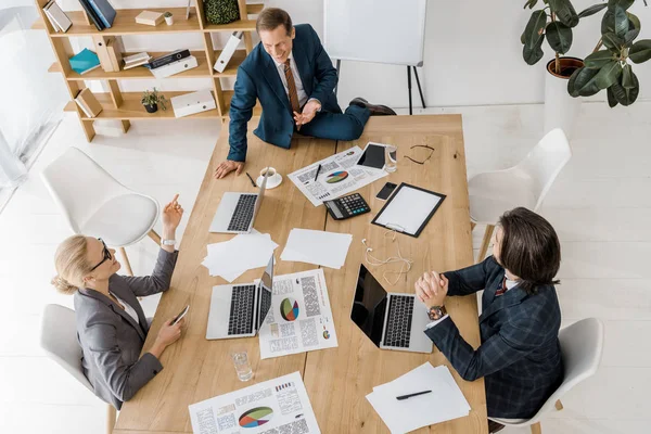 Insurance workers talking at meeting in office — Stock Photo