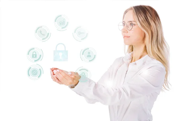 Side view of businesswoman in eyeglasses holding cyber security signs isolated on white — Stock Photo