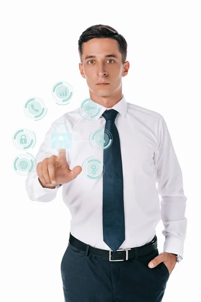 Portrait of concentrated businessman pointing at cyber security signs isolated on white — Stock Photo