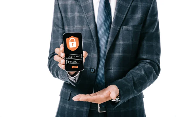 Abgeschnittene Aufnahme von Geschäftsmann im Anzug zeigt Smartphone mit Cyber-Sicherheitszeichen auf dem Bildschirm isoliert auf weiß — Stockfoto