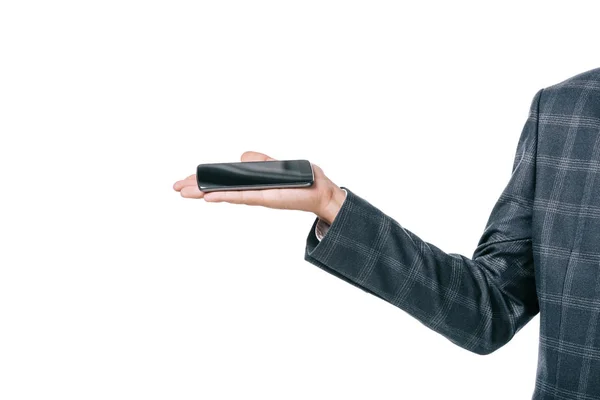 Cropped shot of businessman holding smartphone on palm isolated on white — Stock Photo