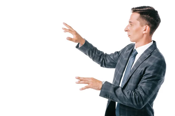 Vista lateral do homem de negócios em terno gesto isolado em branco — Fotografia de Stock