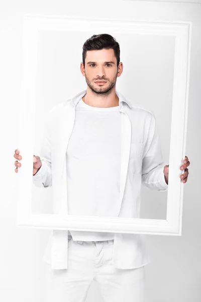 Schöner erwachsener Mann mit Rahmen isoliert auf weiß — Stockfoto