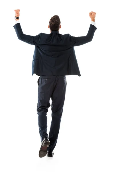 Vista posterior del hombre de negocios en traje gesto y regocijo aislado en blanco - foto de stock