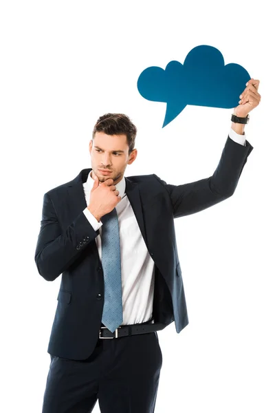 Concentrated businessman in suit holding empty blue thought bubble isolated on white — Stock Photo