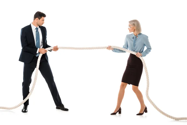 Businesspeople in formal wear playing tug of war isolated on white — Stock Photo