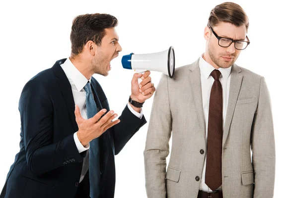 Aggressive boss yelling with megaphone at upset employee isolated on white — Stock Photo