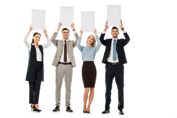 Empresários sorrindo segurando placas vazias isoladas em branco — Fotografia de Stock