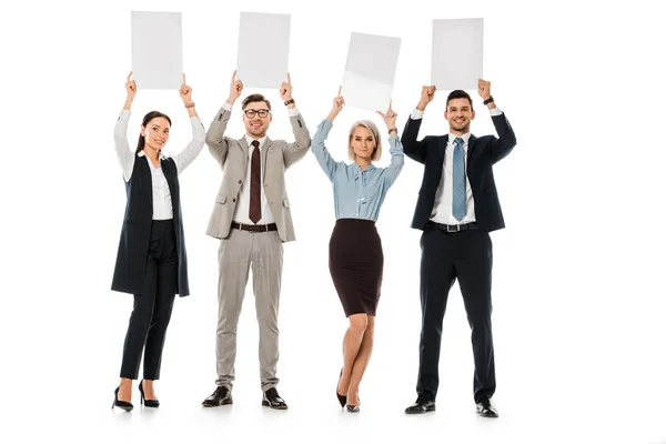 Businesswomen and businessmen holding empty cards isolated on white — Stock Photo
