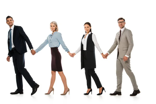 Успішна бізнес команда тримає руки і йде вперед ізольовано на білому — стокове фото