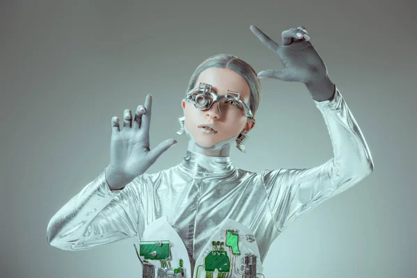 Futuristic silver robot gesturing with hands isolated on grey, future technology concept — Stock Photo