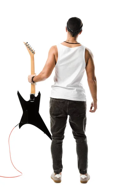 Back view of male rock musician posing with black electric guitar isolated on white — Stock Photo