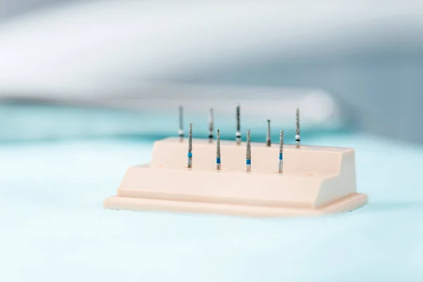 Selective focus of medical implants in dental clinic — Stock Photo