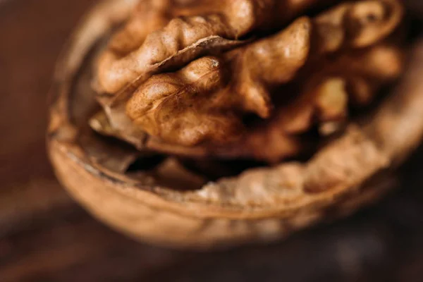 Top view of walnut in nut shell as alzheimer symbol — Stock Photo