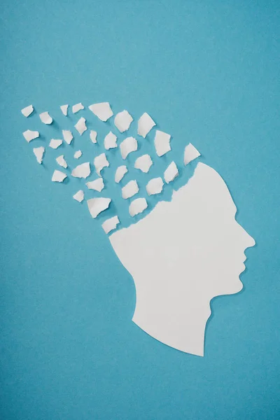 Brain disease symbol presented as head isolated on blue — Stock Photo