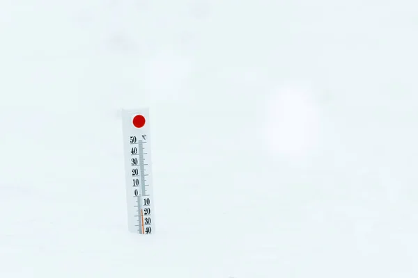 Thermometer showing temperature isolated on white — Stock Photo